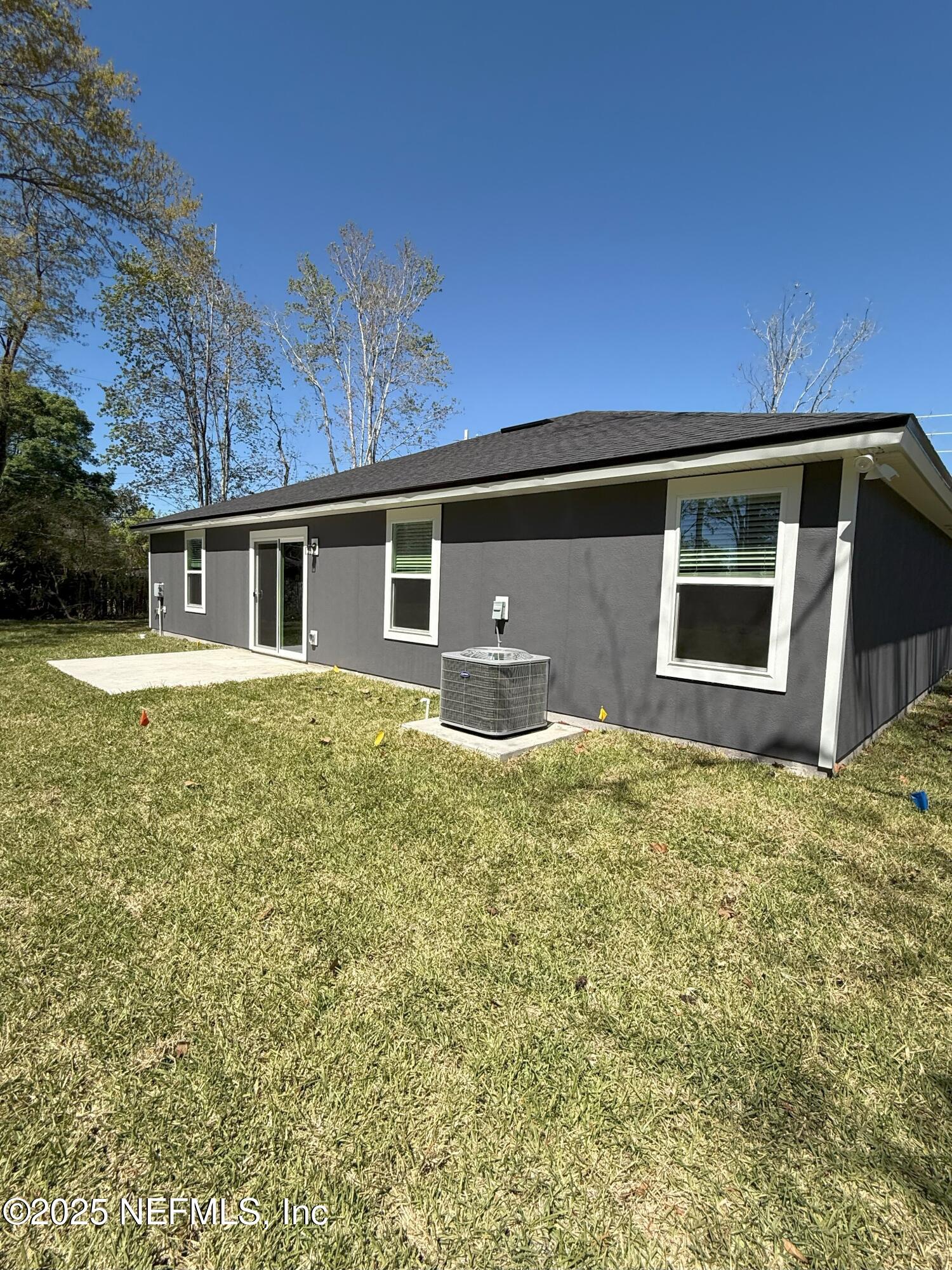 10286 Cisco Drive Jacksonville, FL 32219 - Photo 3 of 45 a front view of a house with garden