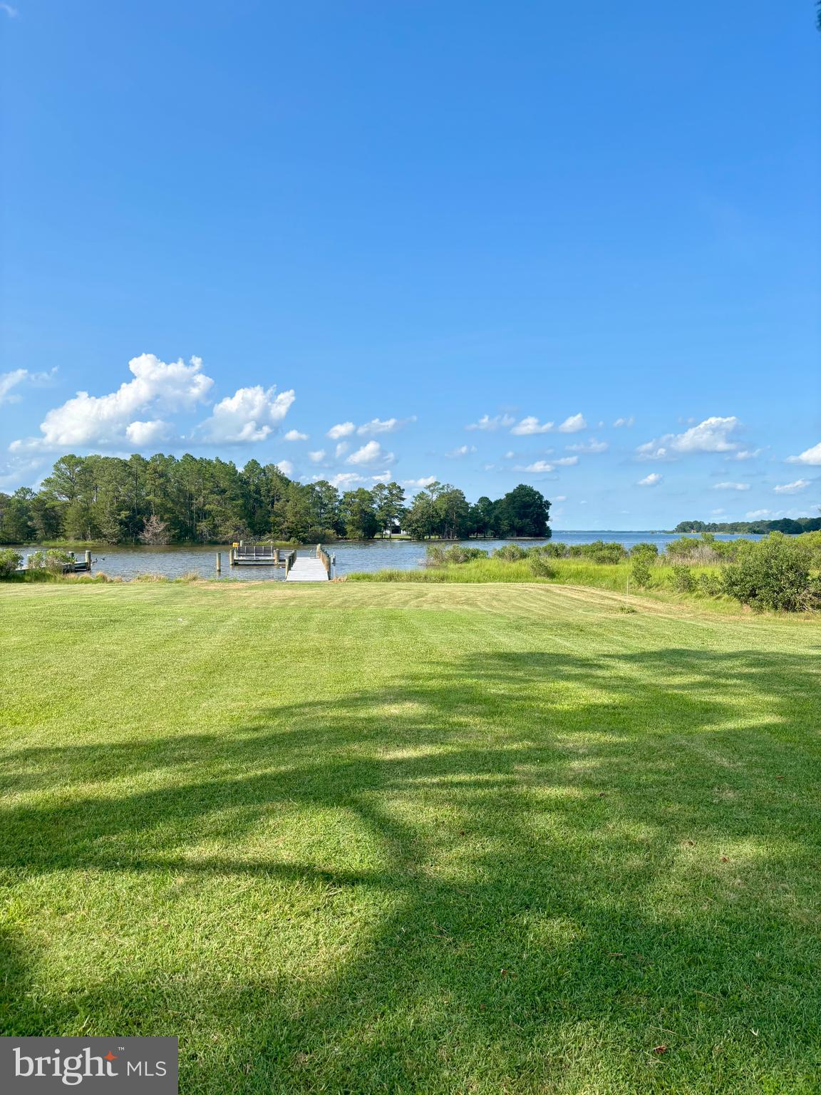 1240 Hudson Road Cambridge, MD 21613 - Photo 17 of 23 Expansive backyard leading to the water
