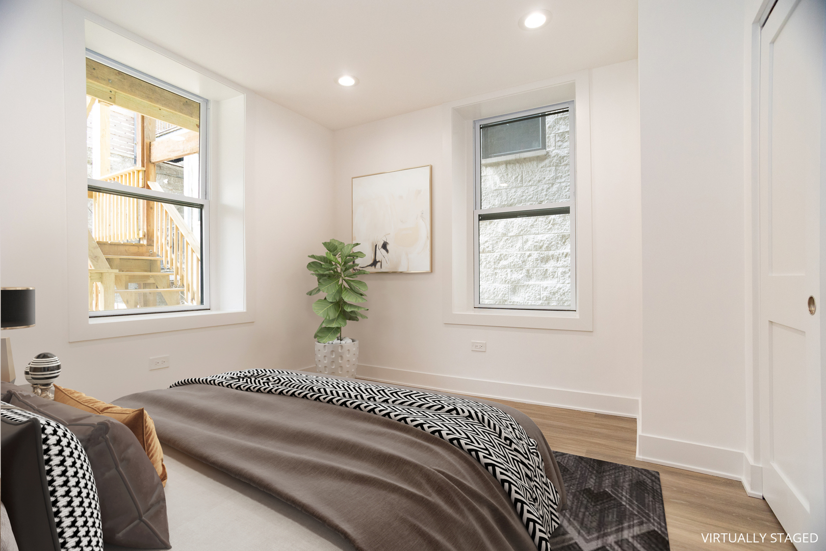 1723 West Pierce Avenue, Unit 1 Chicago, IL 60622 - Photo 10 of 24 a bedroom with a bed and a window