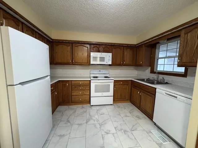 $189,000 | 1120 North Redwood Drive, Independence, MO 64056