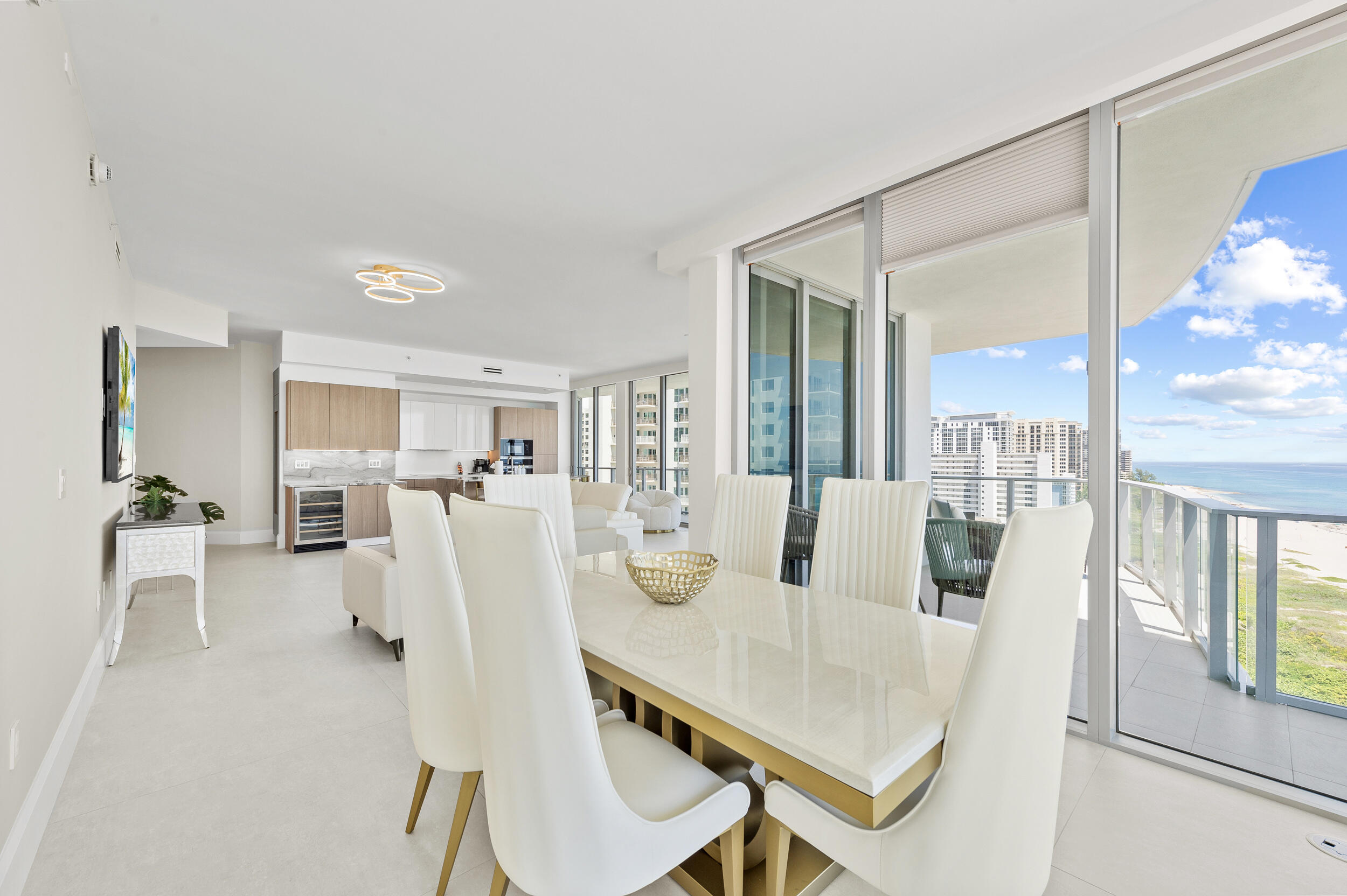 3100 North Ocean Drive, Unit 1103H Riviera Beach, FL 33404 - Photo 16 of 50 a view of a dining room with furniture window and wooden floor