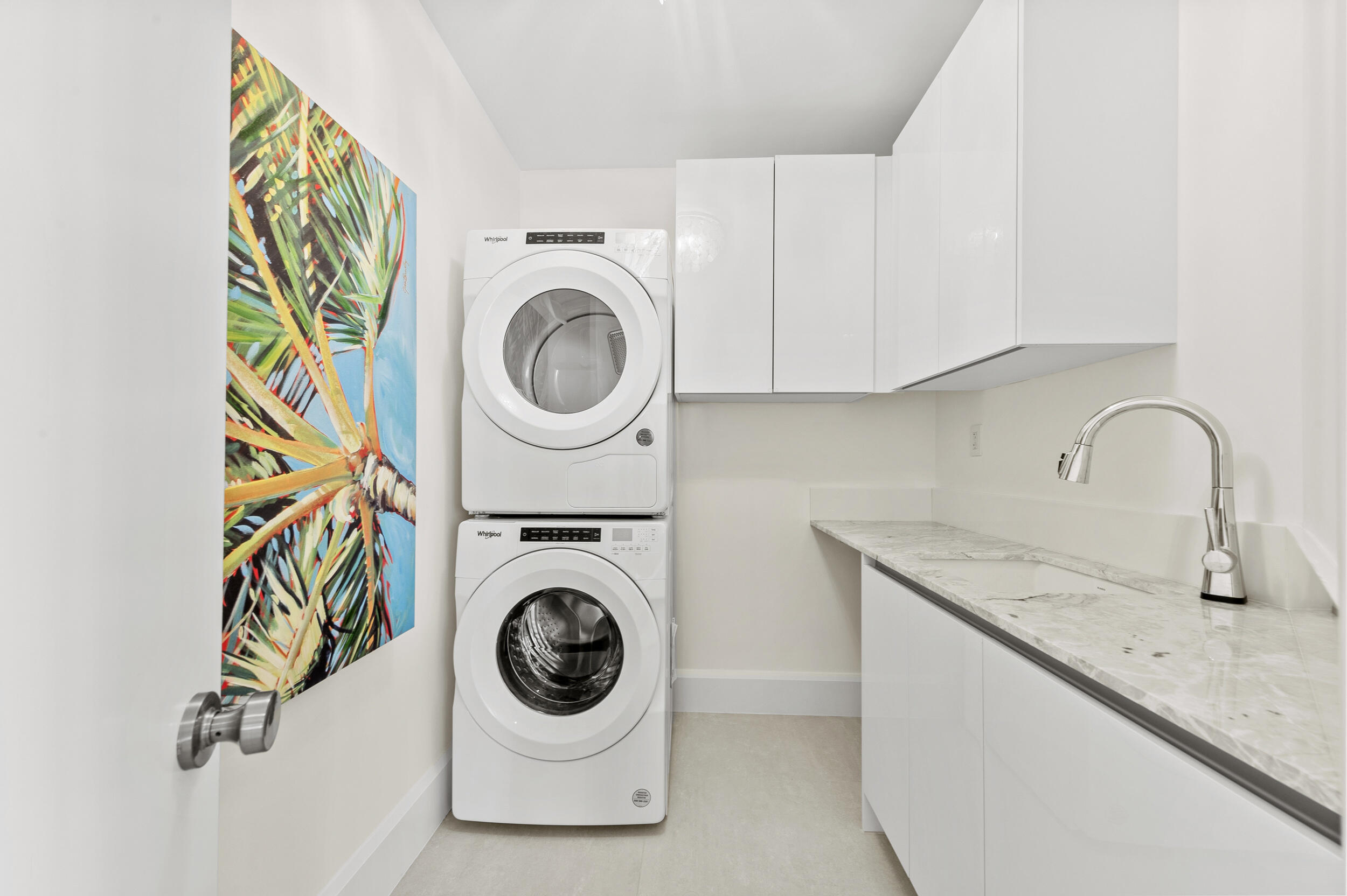 3100 North Ocean Drive, Unit 1103H Riviera Beach, FL 33404 - Photo 47 of 50 a utility room with dryer and washer