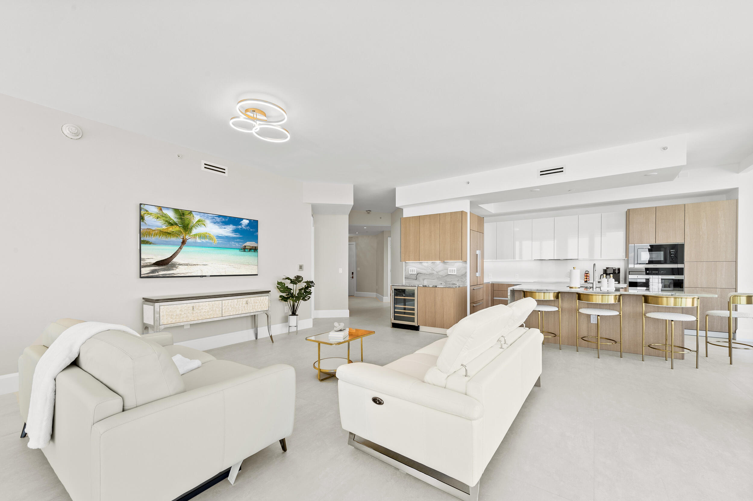3100 North Ocean Drive, Unit 1103H Riviera Beach, FL 33404 - Photo 6 of 50 a living room with furniture and a large window