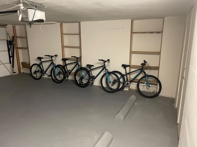 a view of a swimming pool and a yard