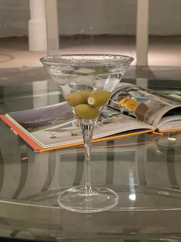 a kitchen with a stove a sink and a cabinets