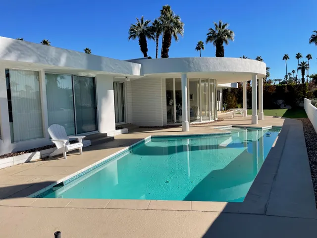a view of a balcony with an outdoor space