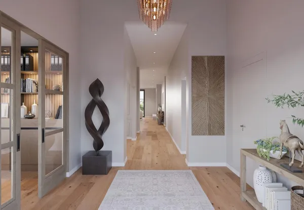 a view of entryway and hall with wooden floor