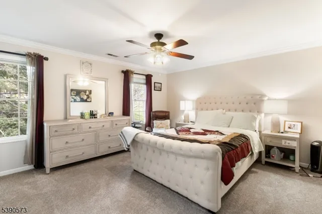 a bed room with a bed and a window