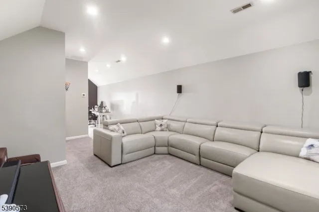 a living room with furniture and a couch