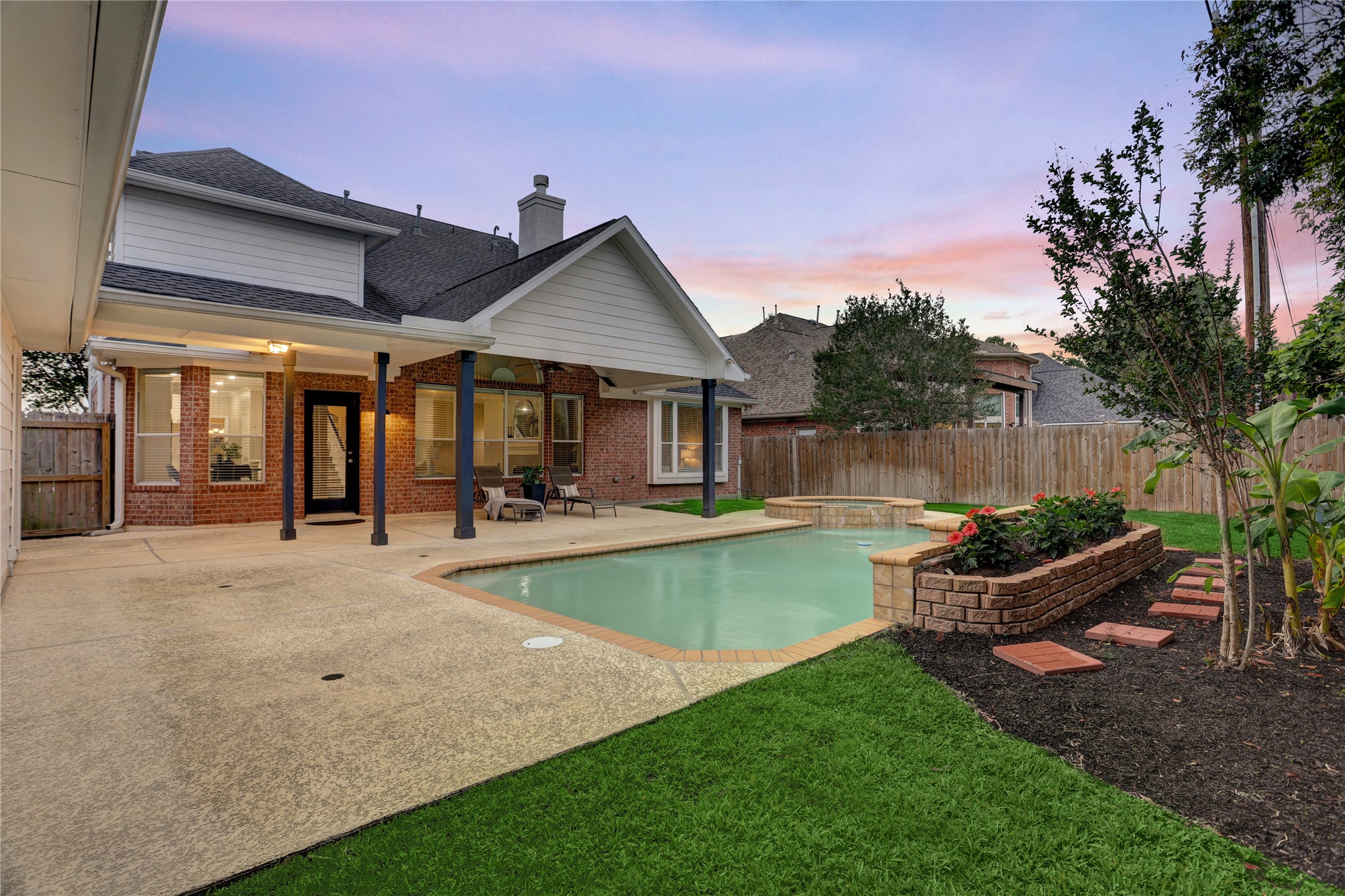24418 Falcon Point Drive Katy, TX 77494 - Photo 32 of 40 a view of a patio with chair and tables