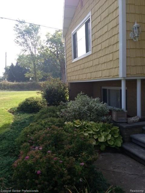 2384 East Cook Road Grand Blanc, MI 48439 - Photo 3 of 26 Front landscaping