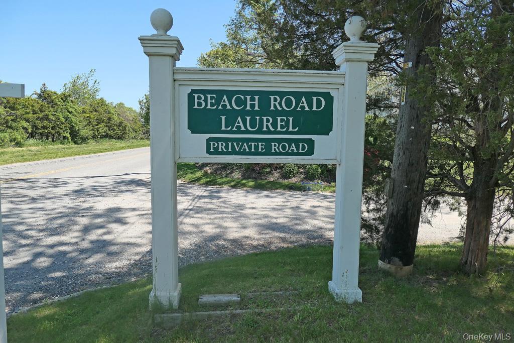 46 Beach Road Laurel, NY 11948 - Photo 21 of 24 a sign on the side of the building
