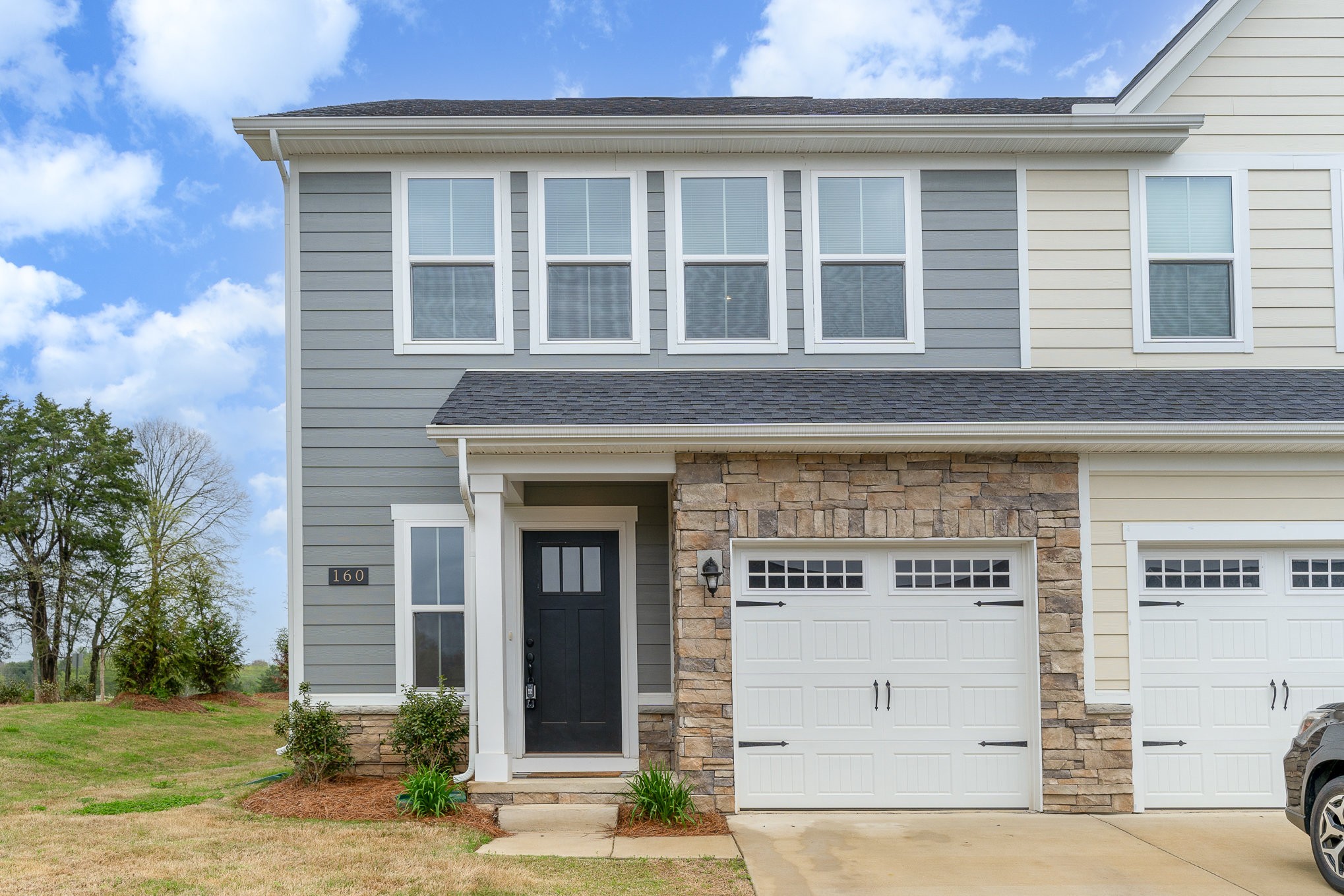 160 Keelon Gap Road Spring Hill, TN 37174 - Photo 1 of 32 a front view of a house with a yard