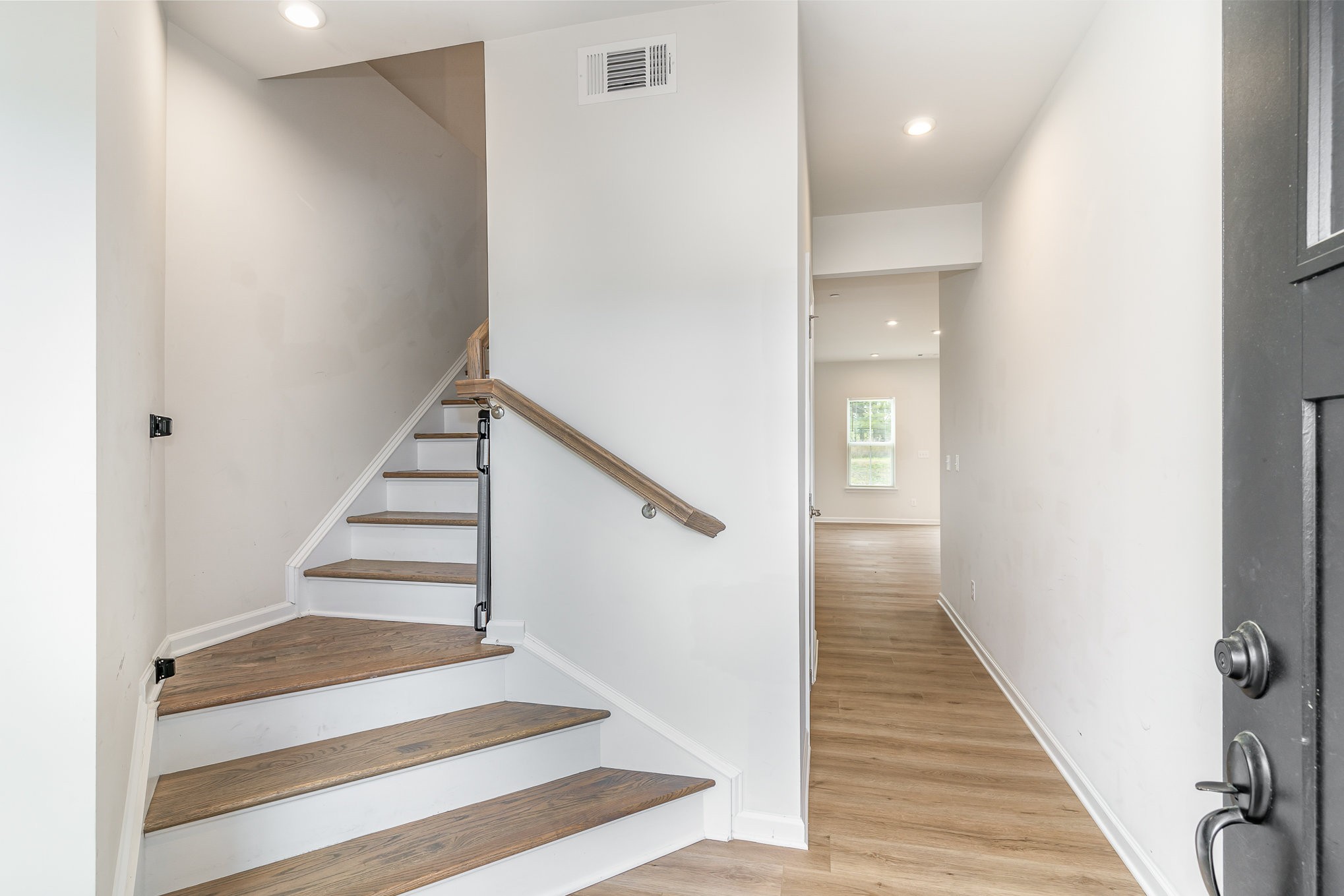 160 Keelon Gap Road Spring Hill, TN 37174 - Photo 19 of 32 a view of staircase with wooden floor and white walls