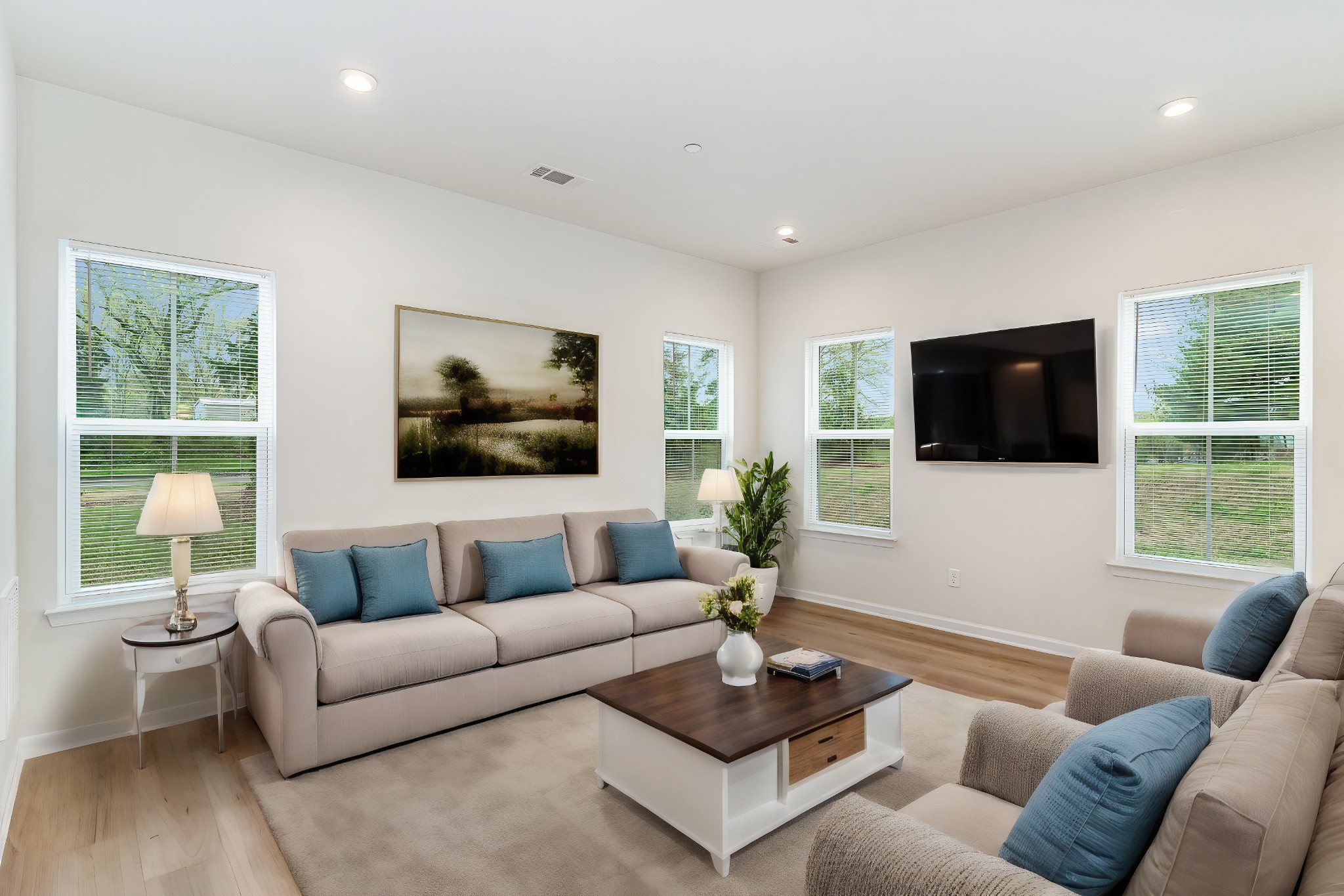 160 Keelon Gap Road Spring Hill, TN 37174 - Photo 6 of 32 a living room with furniture a flat screen tv and a large window