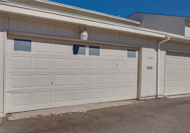 a view of a terrace with wooden fence