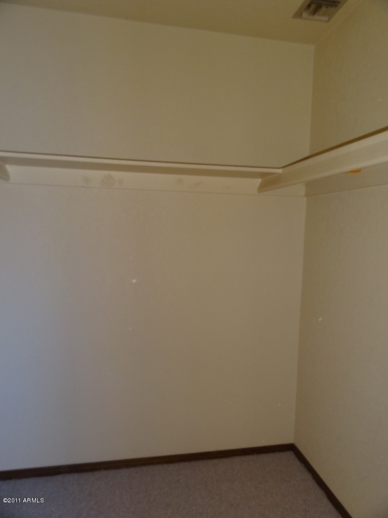 2329 North Recker Road, Unit 8 Mesa, AZ 85215 - Photo 16 of 24 Master Walk-in Closet
