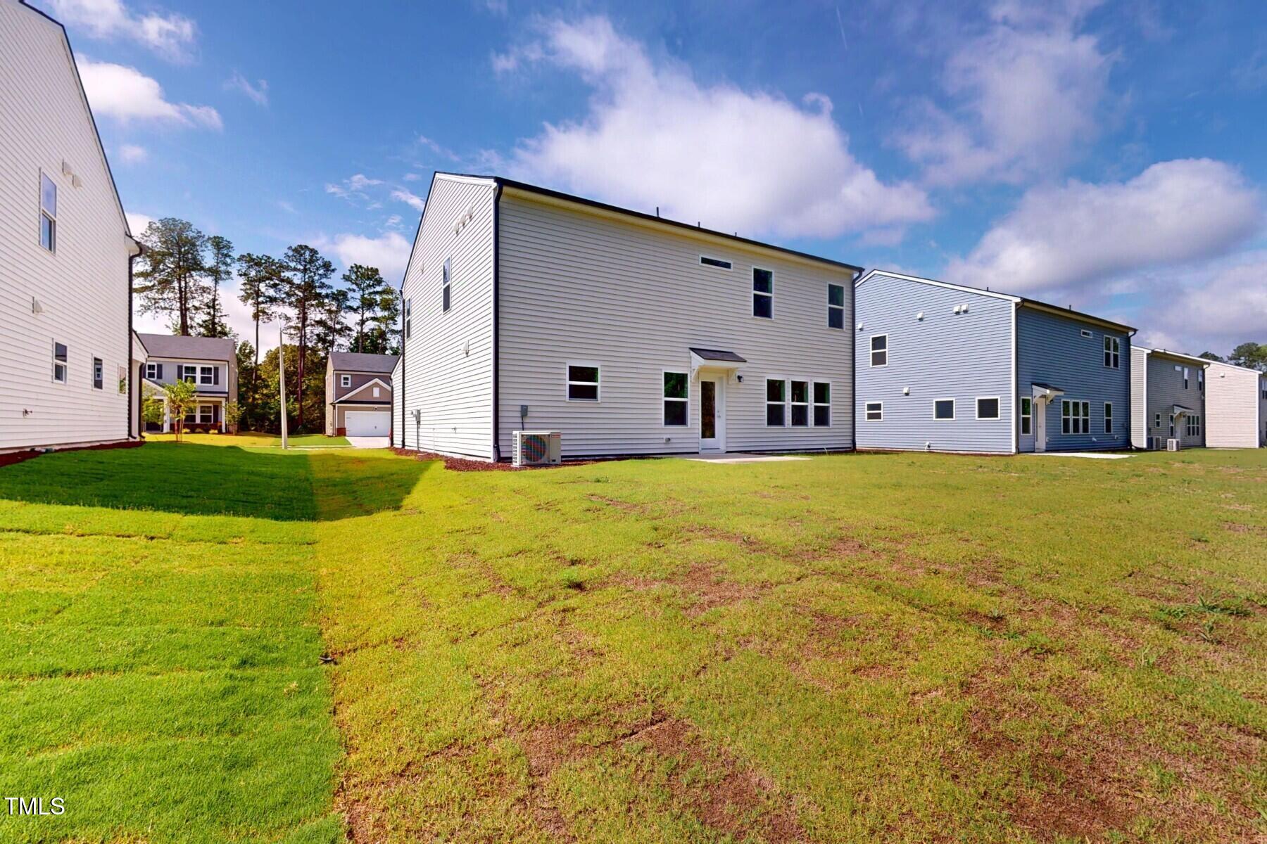 1229 Dimaggio Drive, Unit 8 Raleigh, NC 27616 - Photo 4 of 37 Rear Exterior