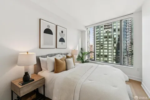 a view of a living room and balcony