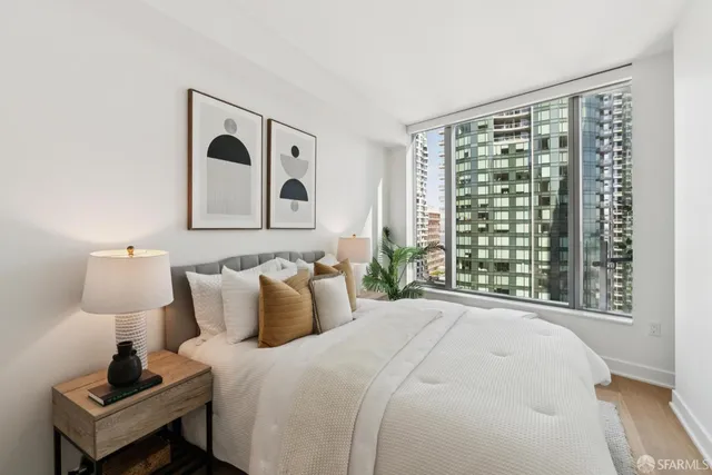 a view of a living room and balcony