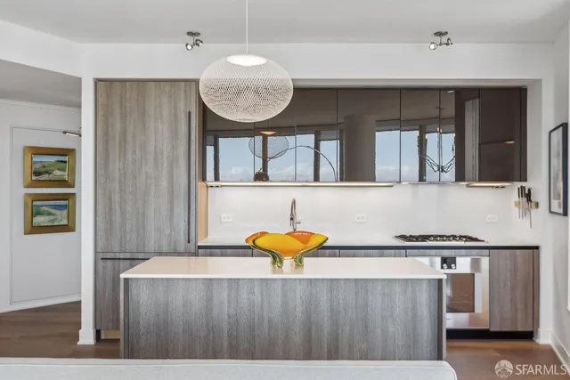 wooden floor in a kitchen and a table