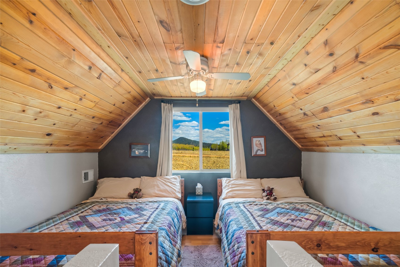 15 Mallard Road Como, CO 80432 - Photo 28 of 49 a bedroom with two beds and a window