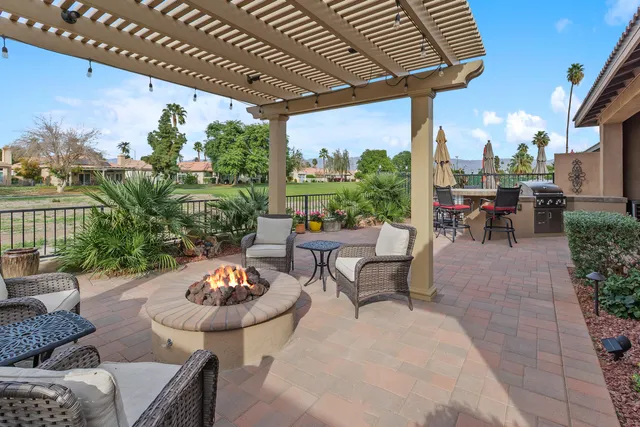 a outdoor living space with furniture and garden view