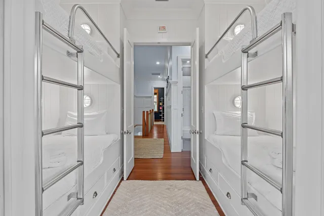 a view of a house with backyard and a tree