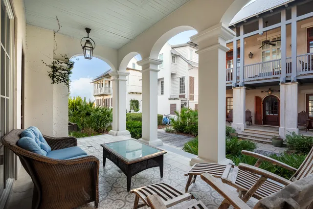 a view of a dining room with furniture wooden floor and chandelier