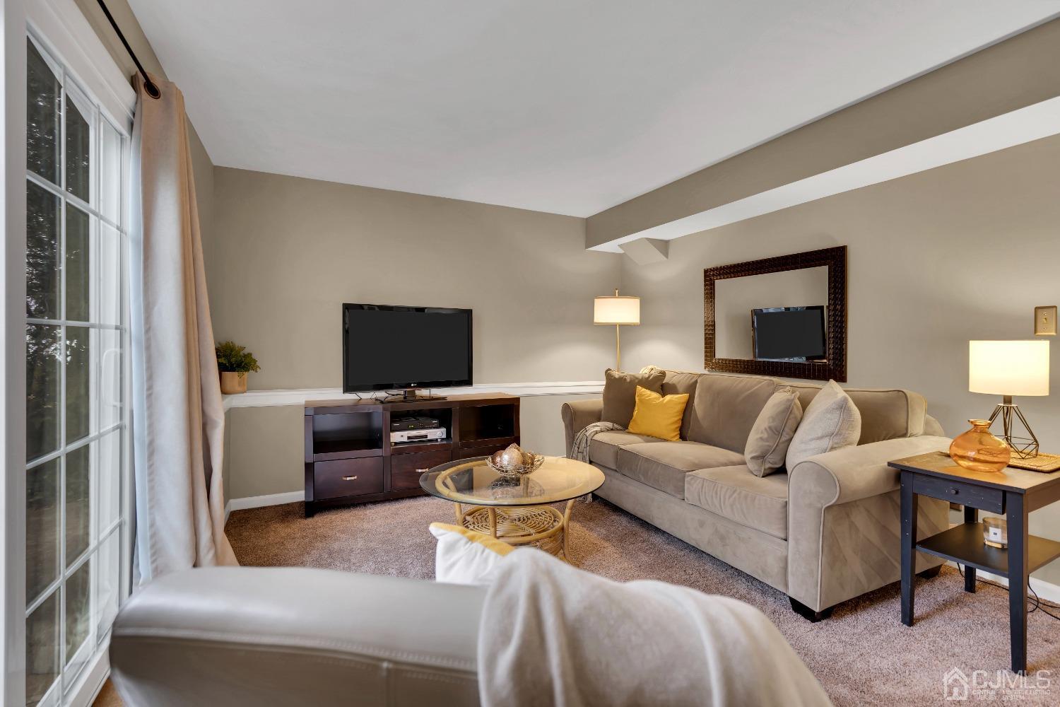 19 Calvin Court Old Bridge, NJ 08857 - Photo 13 of 25 a living room with furniture and a flat screen tv