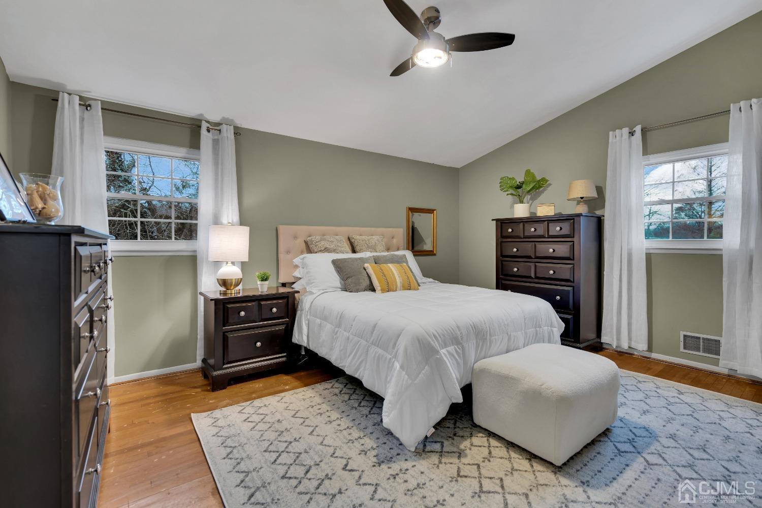 19 Calvin Court Old Bridge, NJ 08857 - Photo 19 of 25 a bedroom with a bed and dresser with mirror