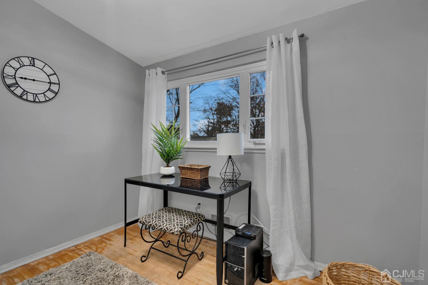 19 Calvin Court Old Bridge, NJ 08857 - Photo 21 of 25 a view of a workspace with furniture and a window