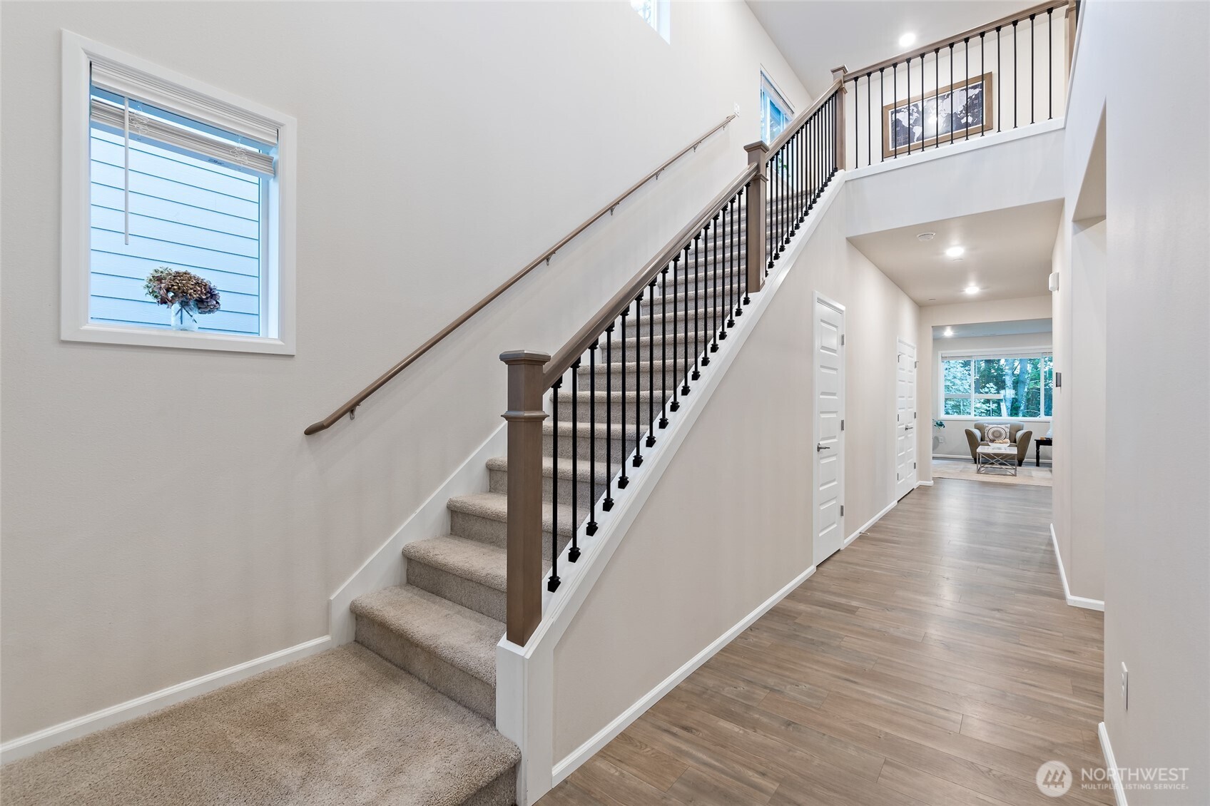 4122 235th Place Southeast Bothell, WA 98021 - Photo 17 of 40 a view of staircase with wooden floor and a rug