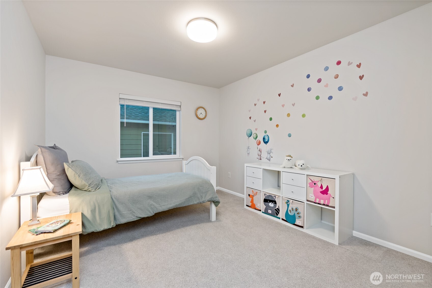 4122 235th Place Southeast Bothell, WA 98021 - Photo 32 of 40 a bedroom with furniture and a window