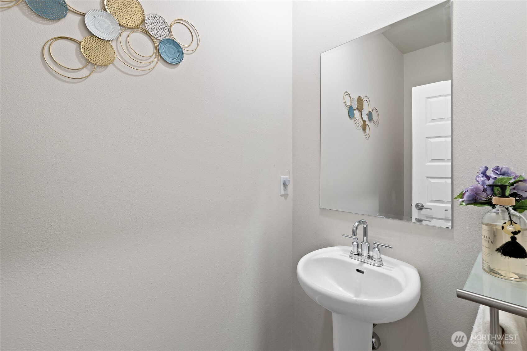 4122 235th Place Southeast Bothell, WA 98021 - Photo 4 of 40 a bathroom with a sink and a mirror