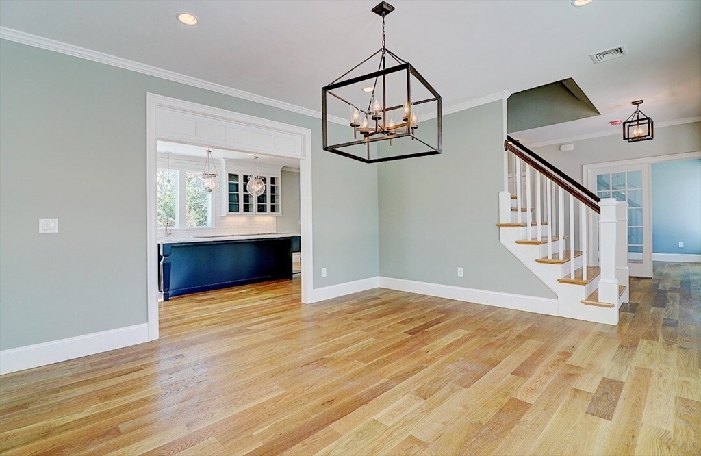 0 Diesel Drive Lincoln, RI 02865 - Photo 4 of 10 a view of empty room with wooden floor and fan
