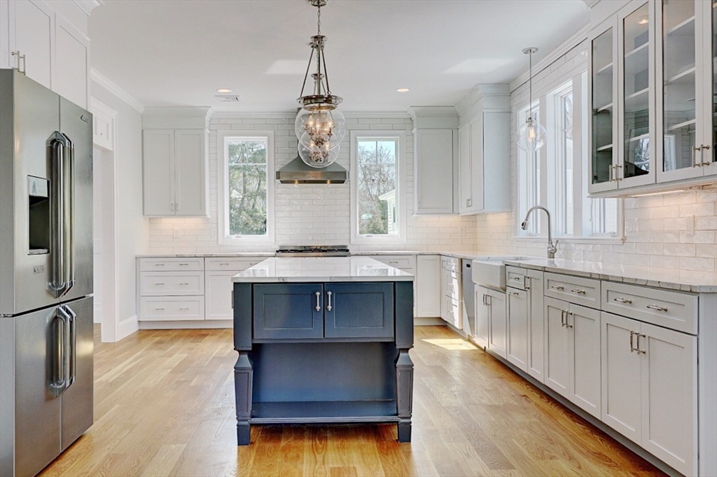 0 Diesel Drive Lincoln, RI 02865 - Photo 7 of 10 a kitchen with kitchen island a counter top space stainless steel appliances and cabinets