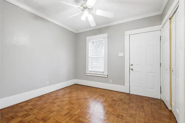 a view of an empty room with a window