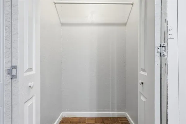 a view of small space with racks on the wall