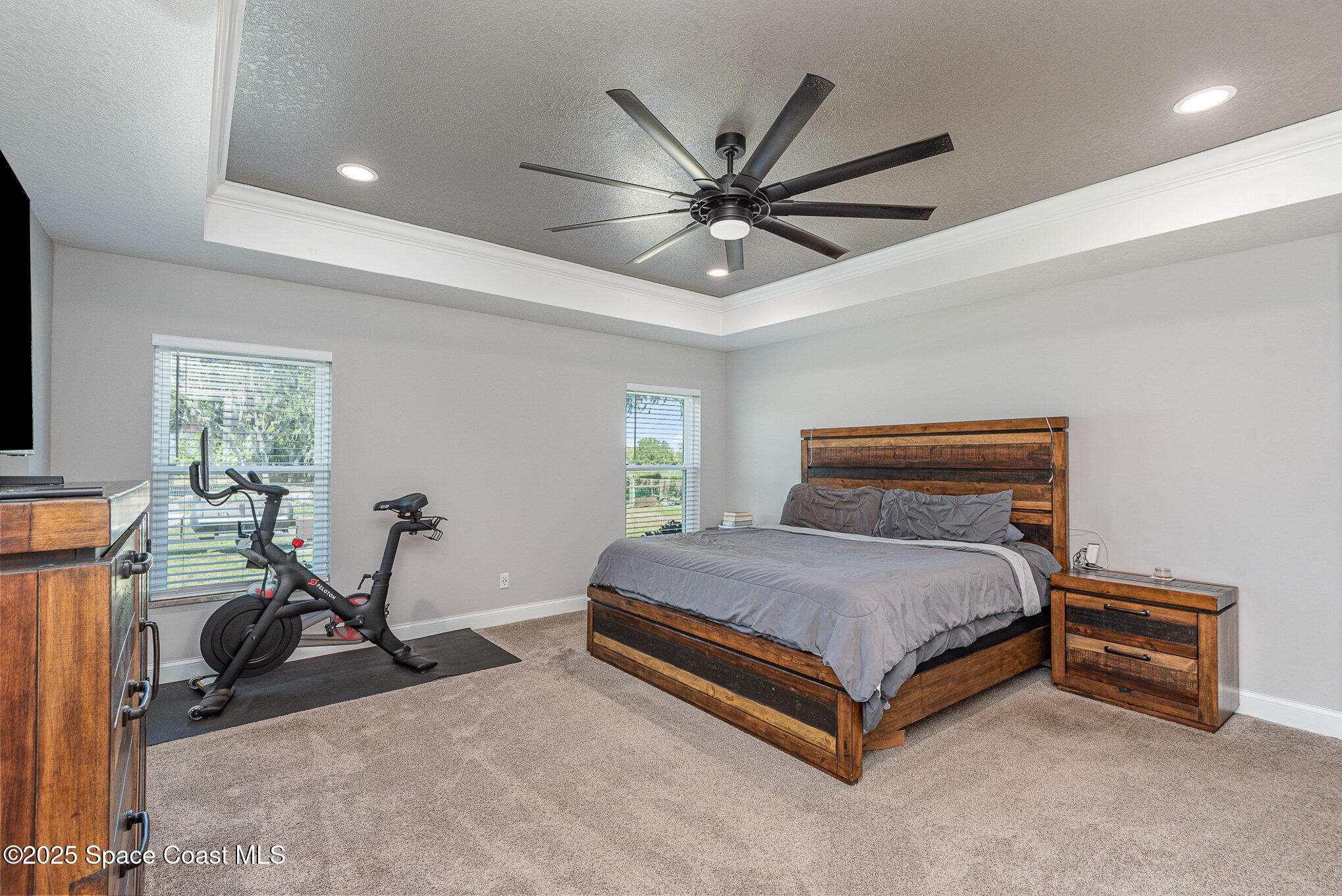 3620 Maebert Road Mims, FL 32754 - Photo 13 of 35 a bedroom with a bed and wooden floor