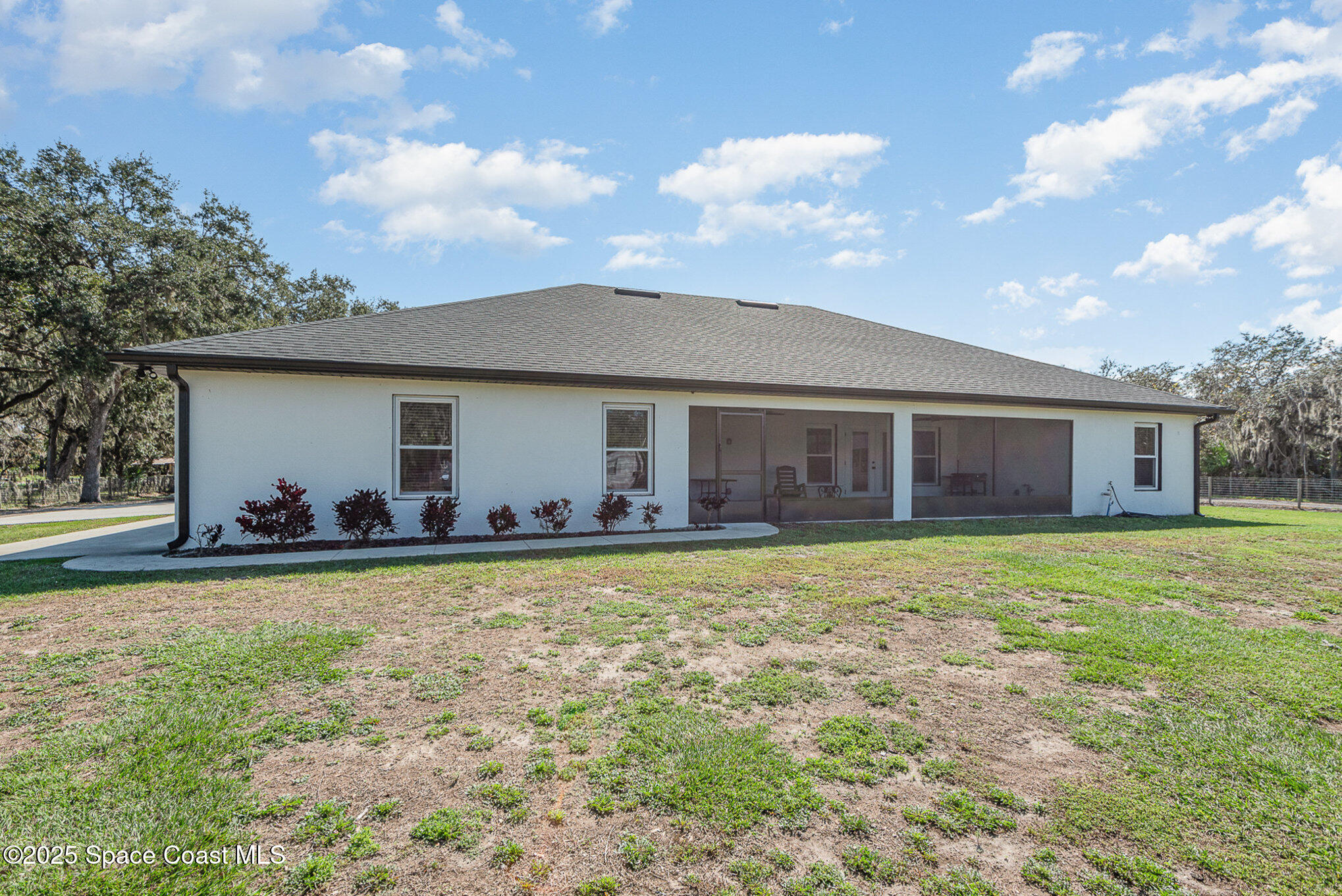 3620 Maebert Road Mims, FL 32754 - Photo 27 of 35 a view of a house with backyard and garden