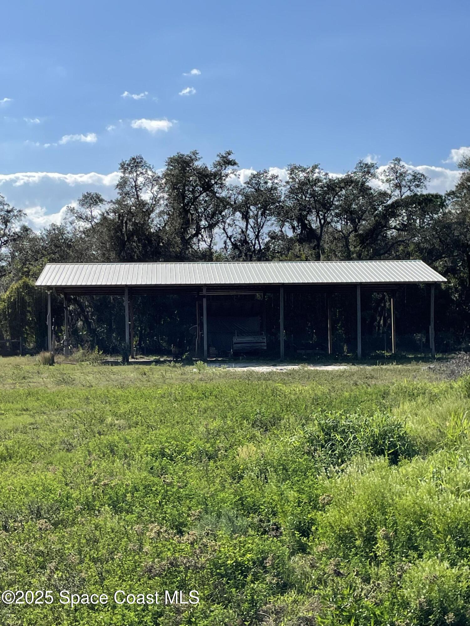 3620 Maebert Road Mims, FL 32754 - Photo 33 of 35 a front view of a house with a yard