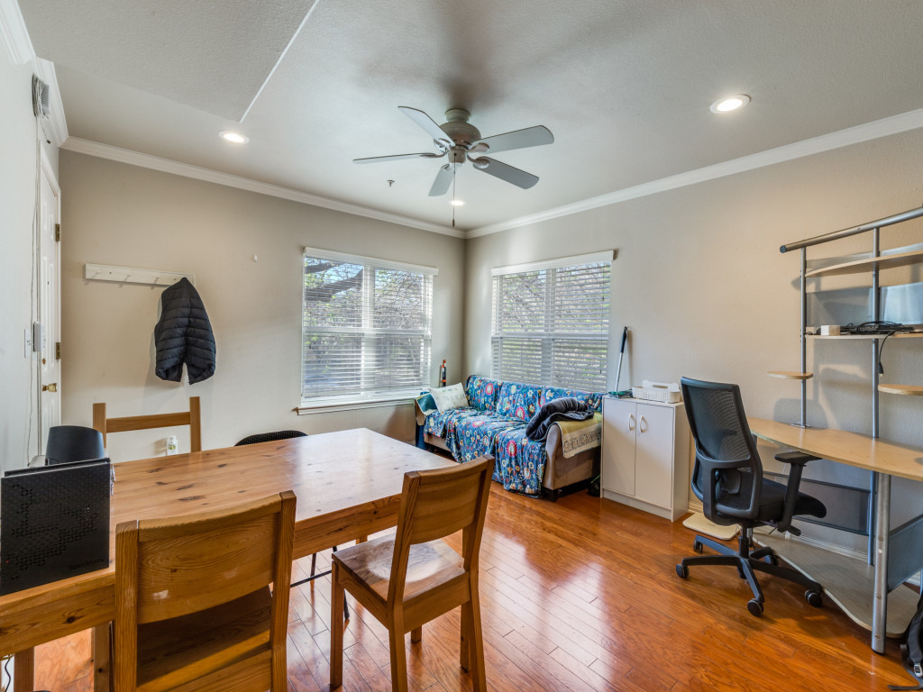 3007 Speedway, Unit 4 Austin, TX 78705 - Photo 14 of 25 a view of a workspace with furniture and a window