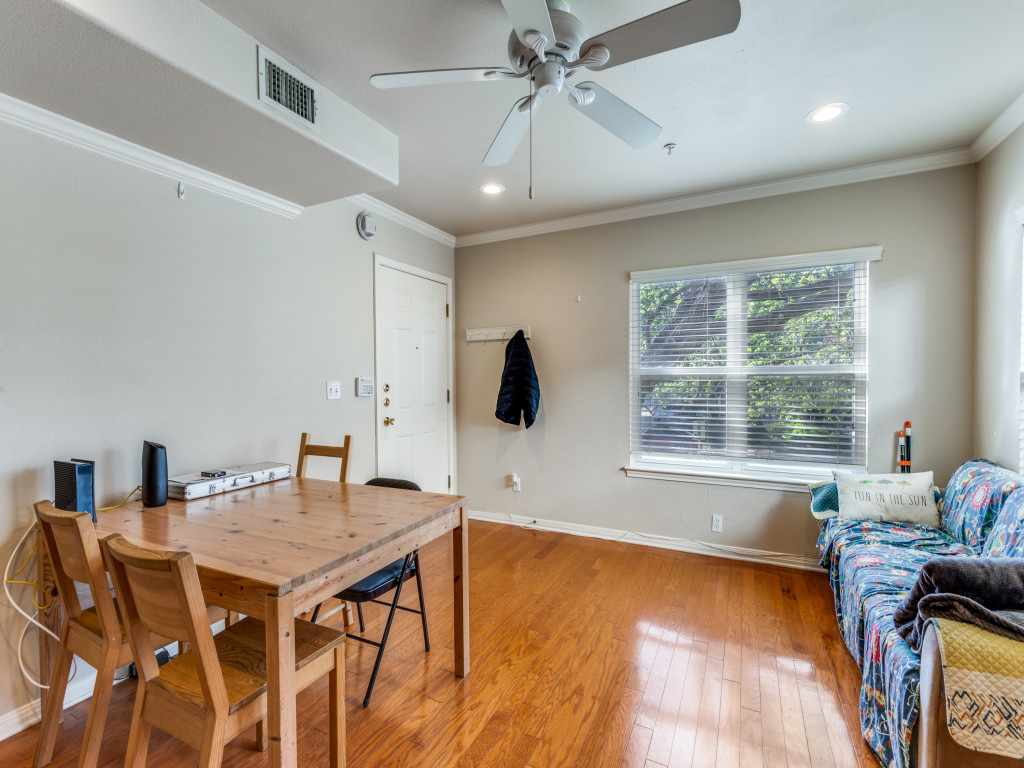 3007 Speedway, Unit 4 Austin, TX 78705 - Photo 9 of 25 a view of a dining room with furniture and wooden floor