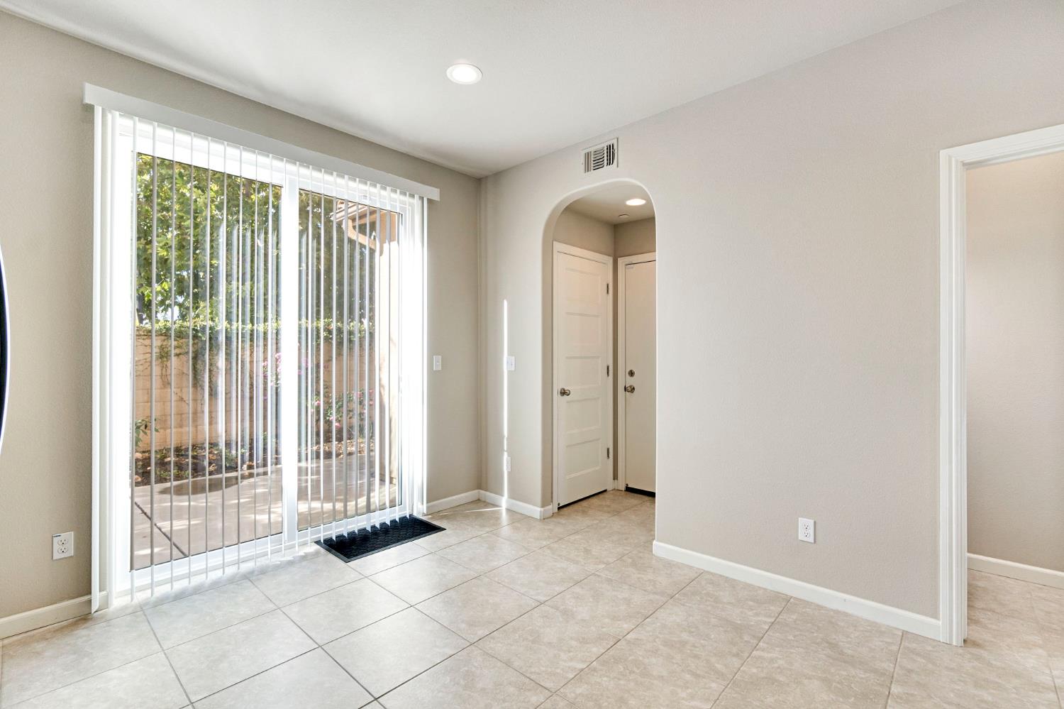1500 North Encoure Way Clovis, CA 93619 - Photo 12 of 37 an empty room with windows and outdoor view