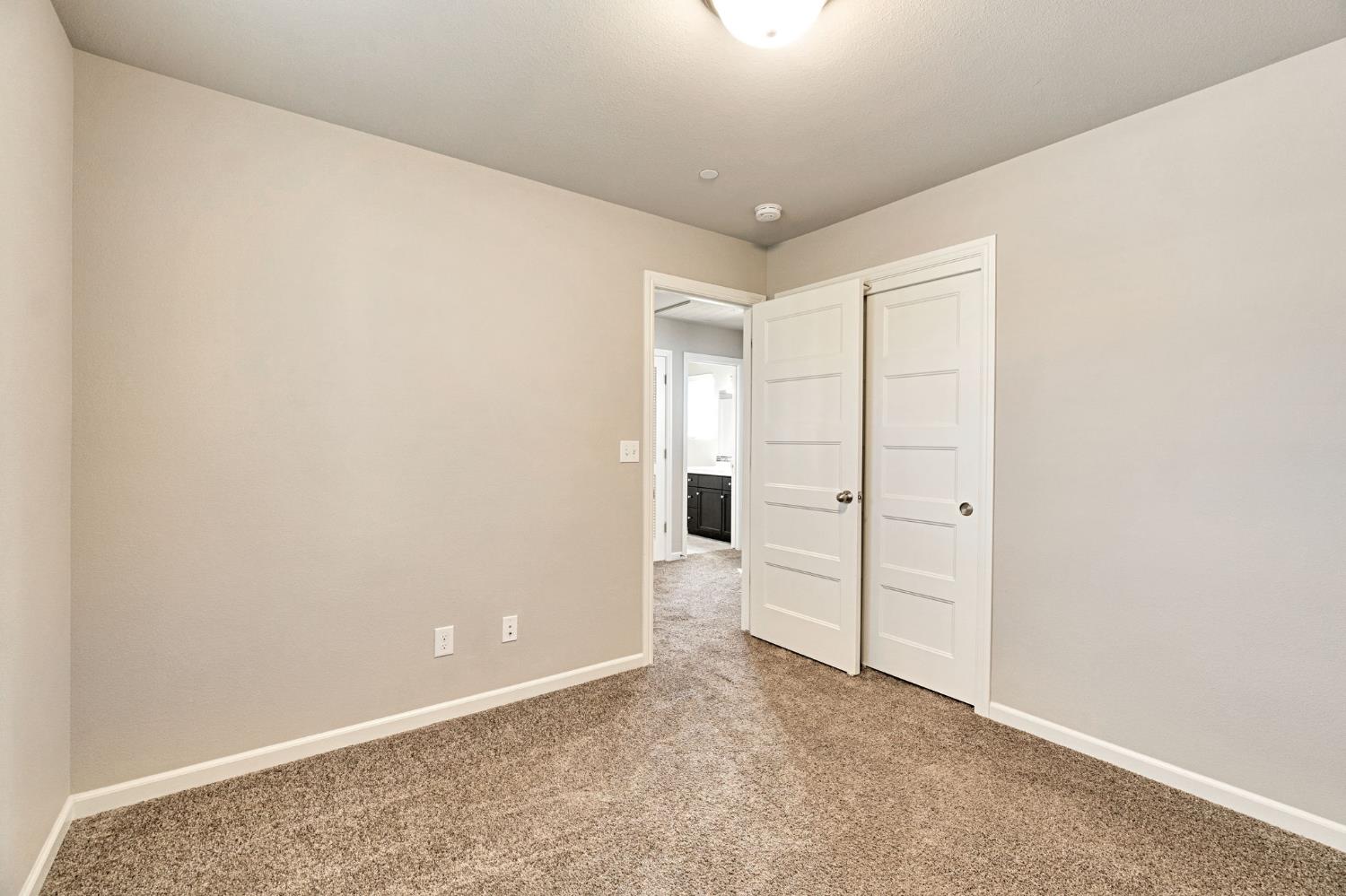 1500 North Encoure Way Clovis, CA 93619 - Photo 22 of 37 an empty room with an entrance