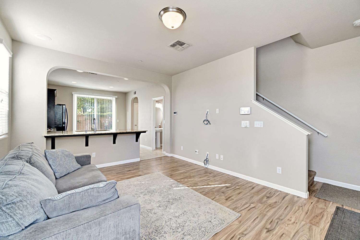 1500 North Encoure Way Clovis, CA 93619 - Photo 5 of 37 a view of livingroom with furniture and window