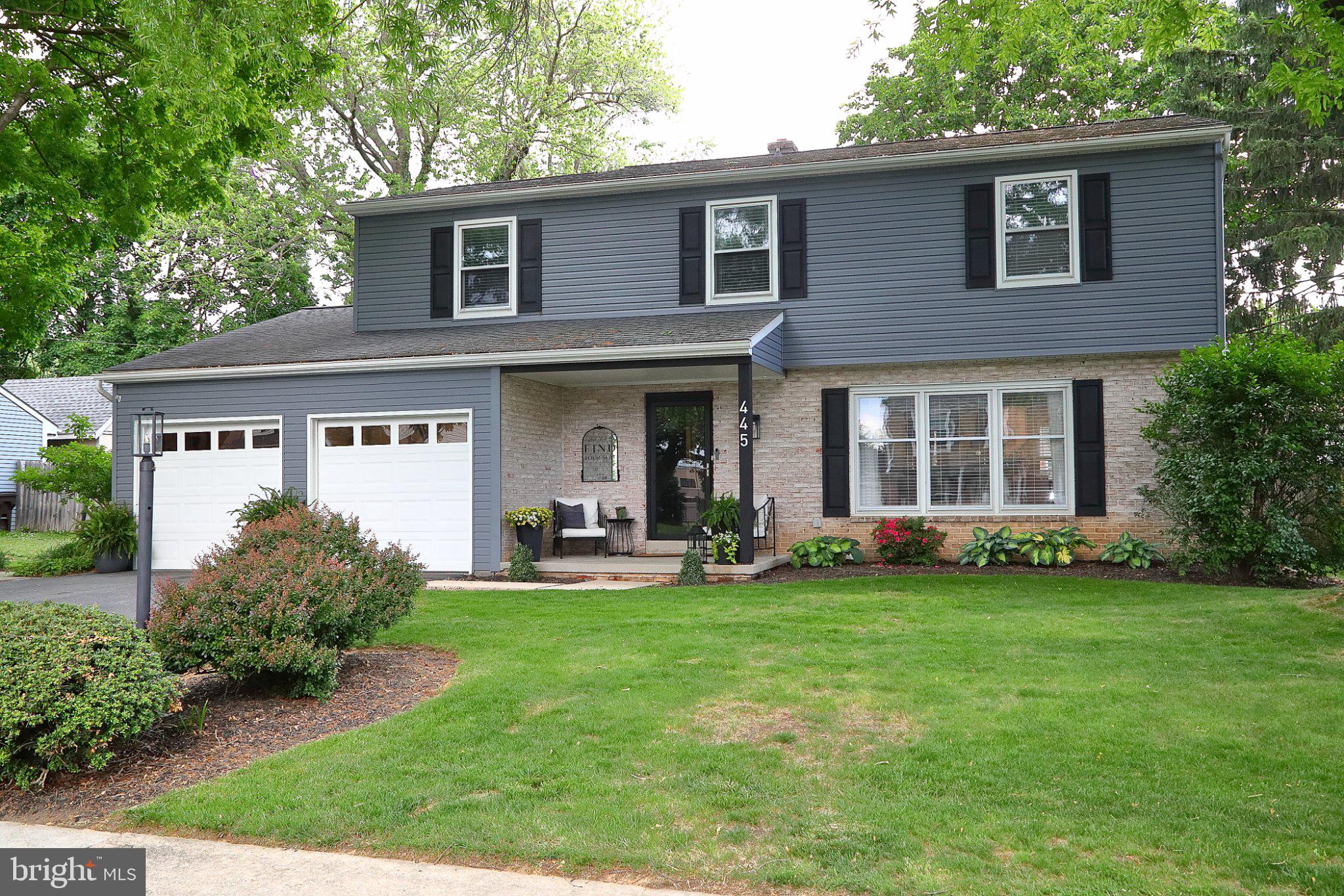 445 Haverhill Road Lancaster, PA 17601 - Photo 2 of 47 Charming two-story home with lush greenery.