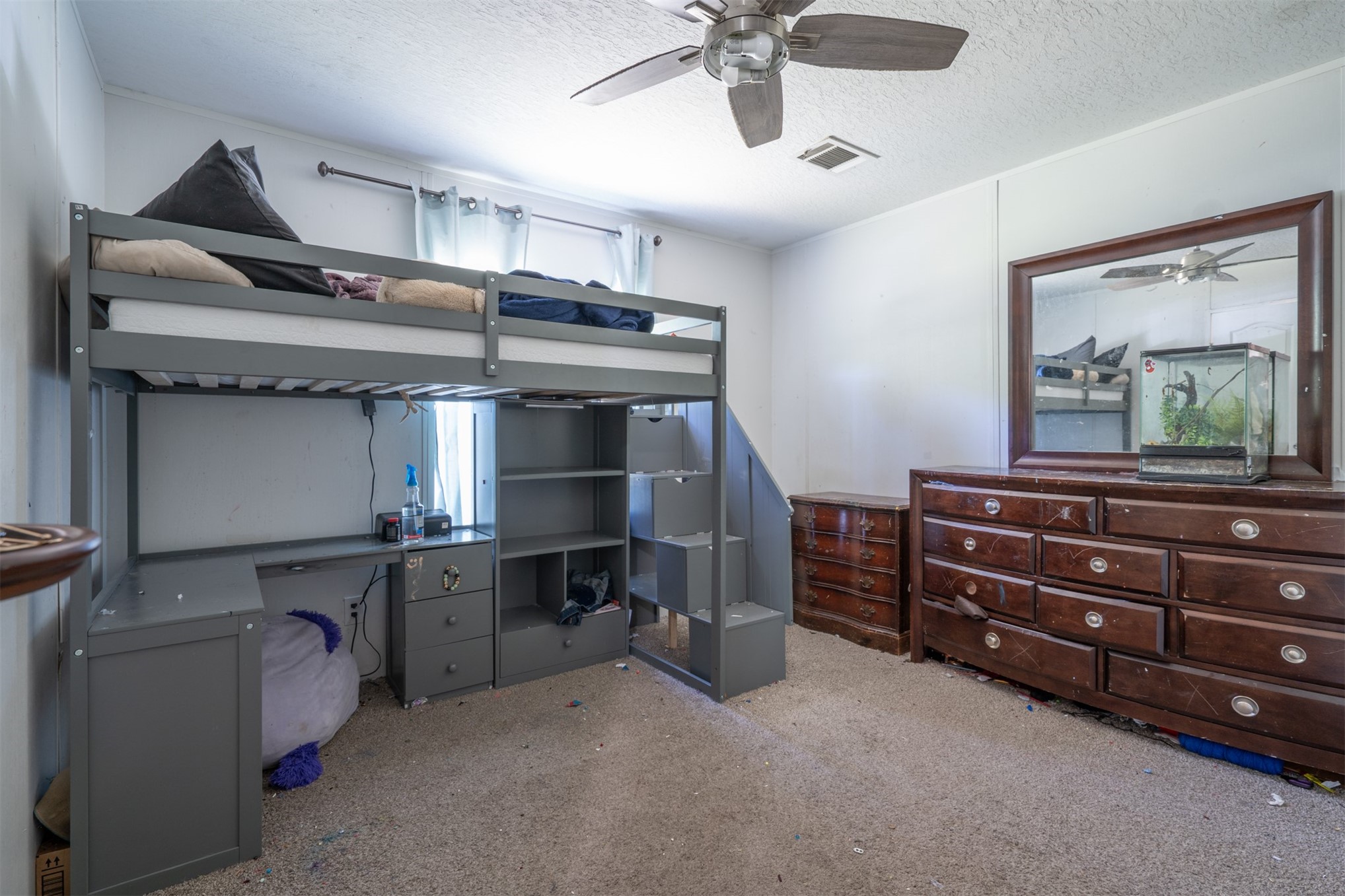 76220 Dove Road Yulee, FL 32097 - Photo 33 of 48 a room with furniture and a chandelier