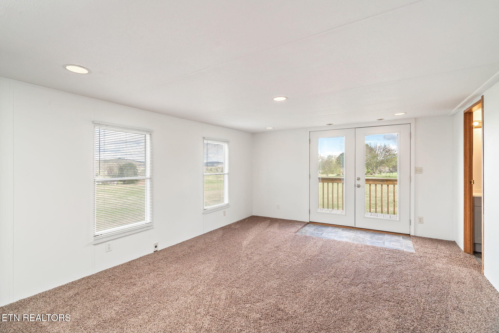 361 Doane Road New Market, TN 37820 - Photo 18 of 39 an empty room with windows
